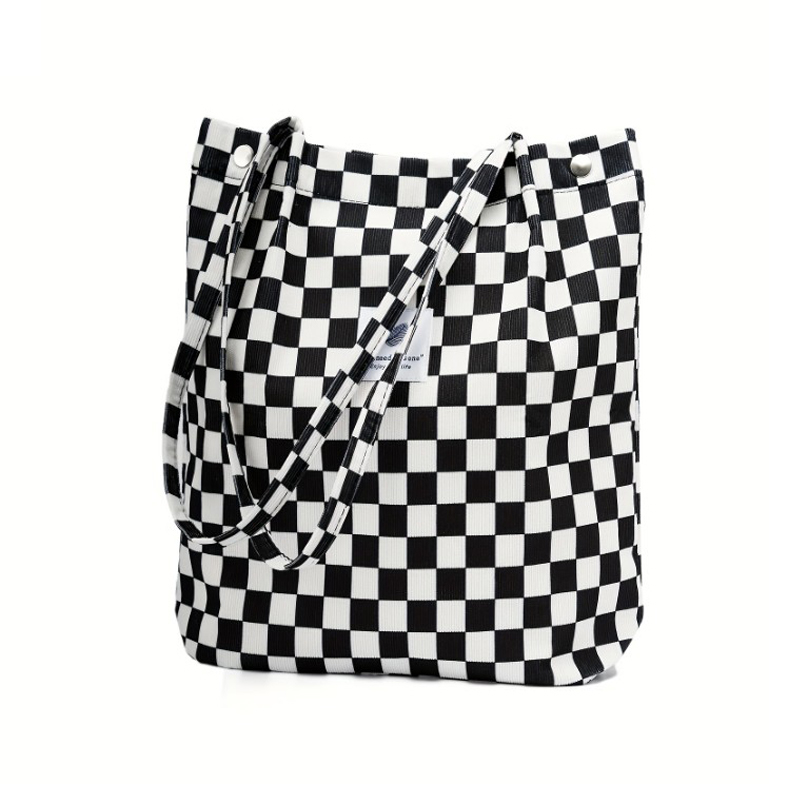 Sac fourre-tout à bandoulière en fourrure à damier noir et blanc